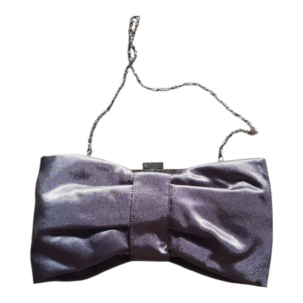 Bijoux Terner Shimmering Silver Bow Clutch